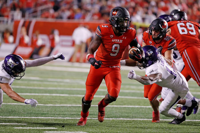 Utah running back Tavion Thomas (9) runs for a touchdown against Weber State.